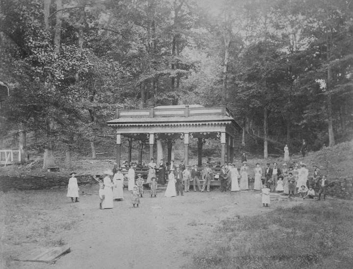 Visitors gathered at a spring pavilion at Blount Springs